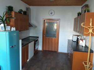 Kuchyň nebo kuchyňský kout v ubytování Pension Art