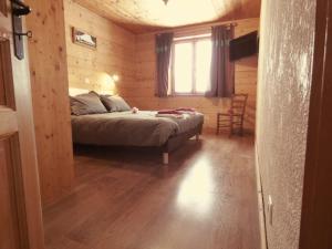 Chalet Le Bois Joli客房内的一张或多张床位