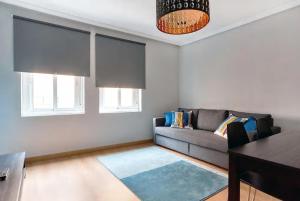 Posezení v ubytování Morales - 2 habitaciones, espacioso y tranquilo junto a Hospital