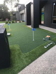 a yard with golf balls and mini golf courses at 4CHP The Sands in Torquay