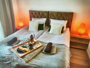Posteľ alebo postele v izbe v ubytovaní Lazy Deer - Apartamenty