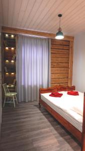 Postel nebo postele na pokoji v ubytování Õhtu Apartments