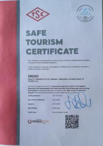a permit for a safe tourism certificate on a clipboard at Oreko Express in Afyon