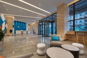Lobbyn eller receptionsområdet på Holiday Inn Express Jinjiang Anhai, an IHG Hotel