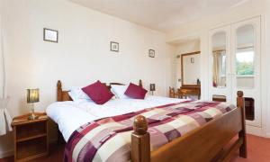 Una cama o camas en una habitación de Stone Howe