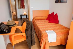 Postel nebo postele na pokoji v ubytování Apartamentos Bahía de Boó