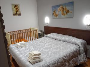 Кровать или кровати в номере Il girasole b&b