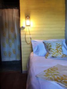 Säng eller sängar i ett rum på Lago Viedma B&B