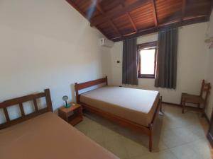 Postel nebo postele na pokoji v ubytování Casa Village Ilha de Mykonos + 40 fotografií