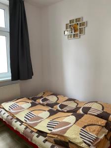Łóżko lub łóżka w pokoju w obiekcie Pokoje na wynajem Sopot