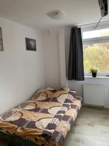 Łóżko lub łóżka w pokoju w obiekcie Pokoje na wynajem Sopot