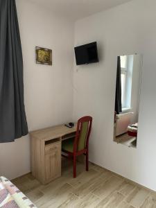 Telewizja i/lub zestaw kina domowego w obiekcie Pokoje na wynajem Sopot