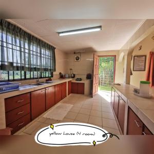 Gallery image of Pandai dickson Banglow white & yellow house in Port Dickson