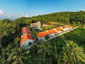 an aerial view of a house with an orange roof at Phu My Hung Bungalow in Phú Quốc