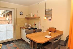 Η κουζίνα ή μικρή κουζίνα στο Ferienwohnung bei Bunsel´s