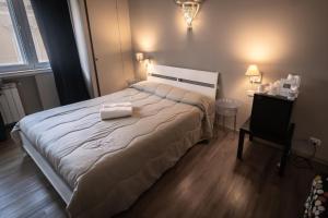 Postel nebo postele na pokoji v ubytování CconfortHotels R&B Cavour