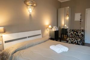 Postel nebo postele na pokoji v ubytování CconfortHotels R&B Cavour