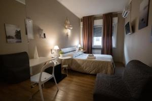 Postel nebo postele na pokoji v ubytování CconfortHotels R&B Cavour