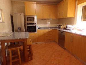 A cozinha ou kitchenette de Casa do Passarinho