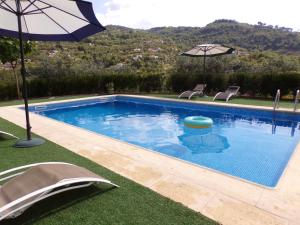 Bazén v ubytování Casa do Passarinho nebo v jeho okolí