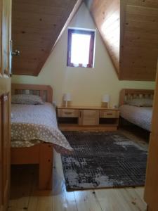 Voodi või voodid majutusasutuse Apartmani Sredojevic toas