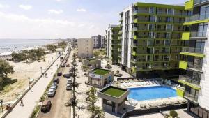 Una representación artística del complejo de apartamentos propuesto en la playa. en Apartament Rebeca Lux by Alezzi Beach Resort, en Mamaia Nord – Năvodari