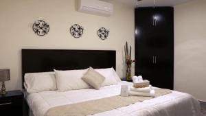 Postelja oz. postelje v sobi nastanitve Hotel Recuerdos
