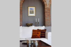 Posezení v ubytování El Quinto Pino, Frigiliana Luxury Country villa with pool and parking HansOnHoliday Rentals