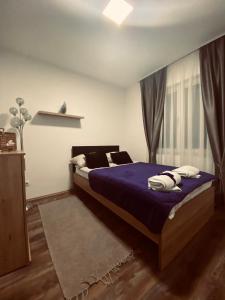 Postel nebo postele na pokoji v ubytování Ana Luxury Apartment ****