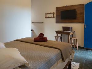 Et tv og/eller underholdning på Sollar dos Gerânios + 48 billeder