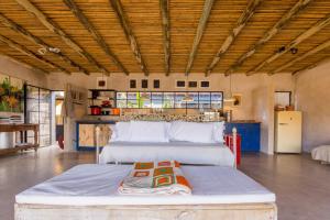 a bedroom with a large bed in a room at Camino Jose Ignacio in José Ignacio