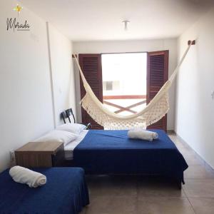 Postel nebo postele na pokoji v ubytování Morada dos Cataventos (Frente Mar)