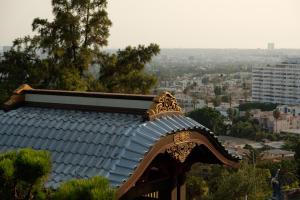 a roof of a building with a city in the background at Hollywood Hills Hotel in Los Angeles