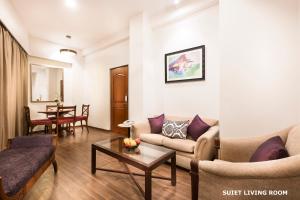 A seating area at Regency Kanchipuram by GRT Hotels