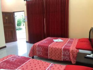 מיטה או מיטות בחדר ב-Hospedaje Adrimaran