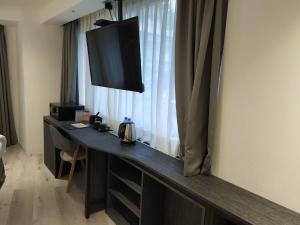 TV o dispositivi per l'intrattenimento presso RF Hotel - Zhongxiao