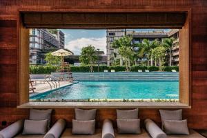  三亚1Hotel海棠湾阳光壹酒店（可持续发展理念）内部或周边的泳池