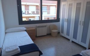 A bed or beds in a room at Holidays Domus Iano