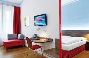 Voodi või voodid majutusasutuse Sorell Hotel Arabelle toas