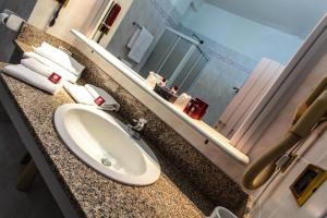Koupelna v ubytování Hotel Grazia Deledda