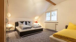 Кровать или кровати в номере Haus Sahin