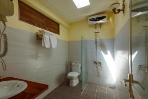 Koupelna v ubytování Mango Beach Resort