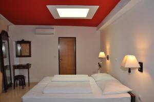 Postel nebo postele na pokoji v ubytování Hotel Carpymore
