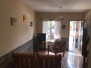 Et tv og/eller underholdning på Triplex 3 habitaciones