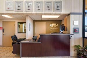 a lobby of a hospital with a reception desk at Econo Lodge in Grand Junction