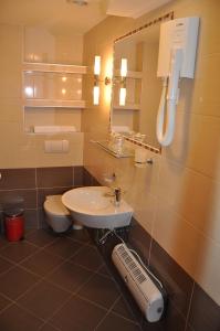 Koupelna v ubytování Hotel Carpymore