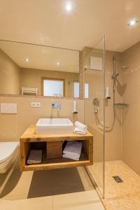 Vannituba majutusasutuses Lifesport Hotel Hechenmoos
