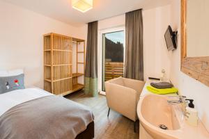 Voodi või voodid majutusasutuse Lifesport Hotel Hechenmoos toas