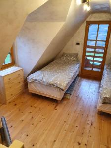 Postel nebo postele na pokoji v ubytování Imperator Kvintil apartmani & SPA