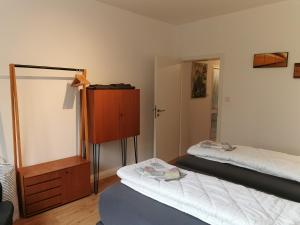 Postel nebo postele na pokoji v ubytování Ferienhaus Fräulein Frenz